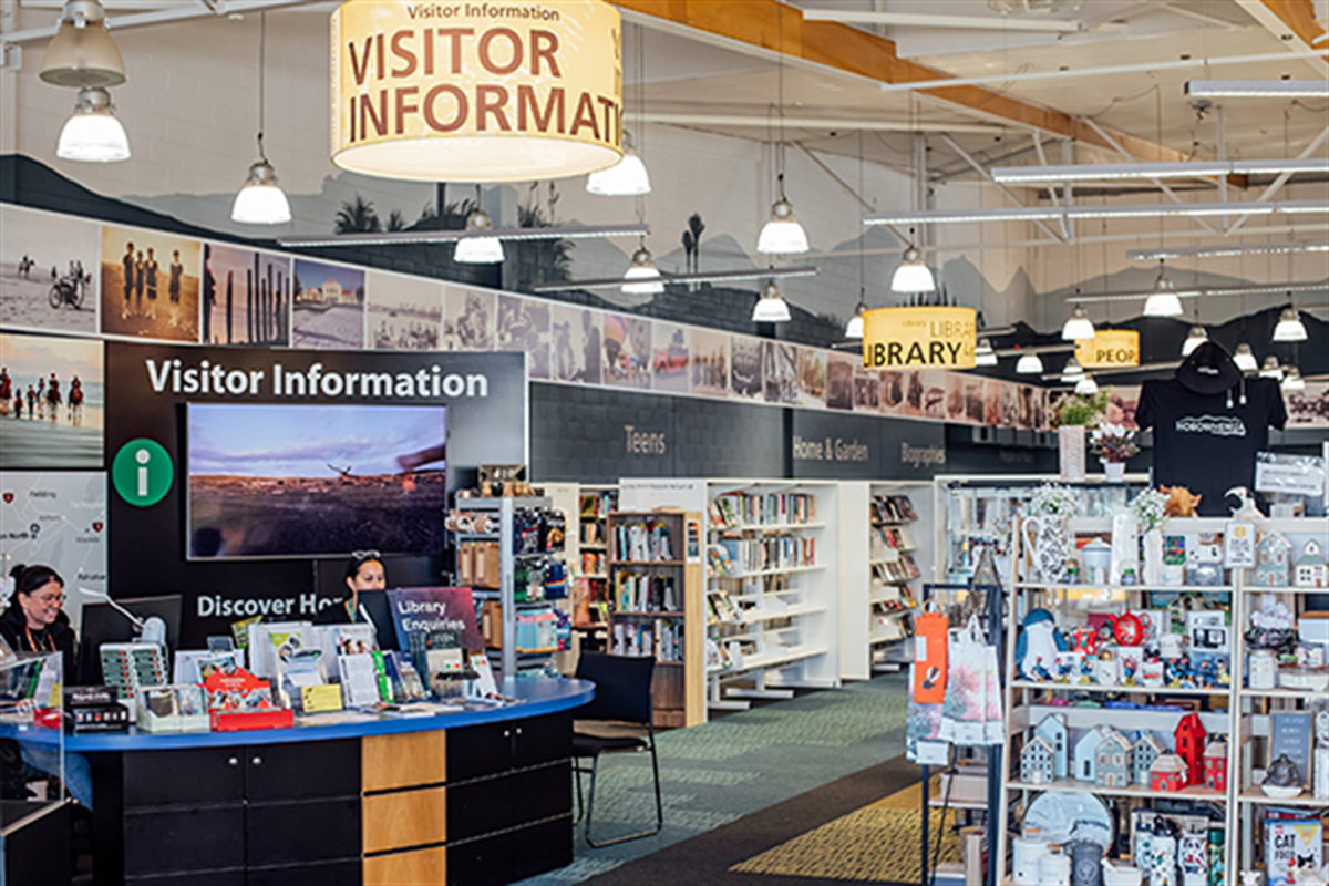 Locations, Hours, and Visit Information features a prominent overhead 'Visitor Information' sign.