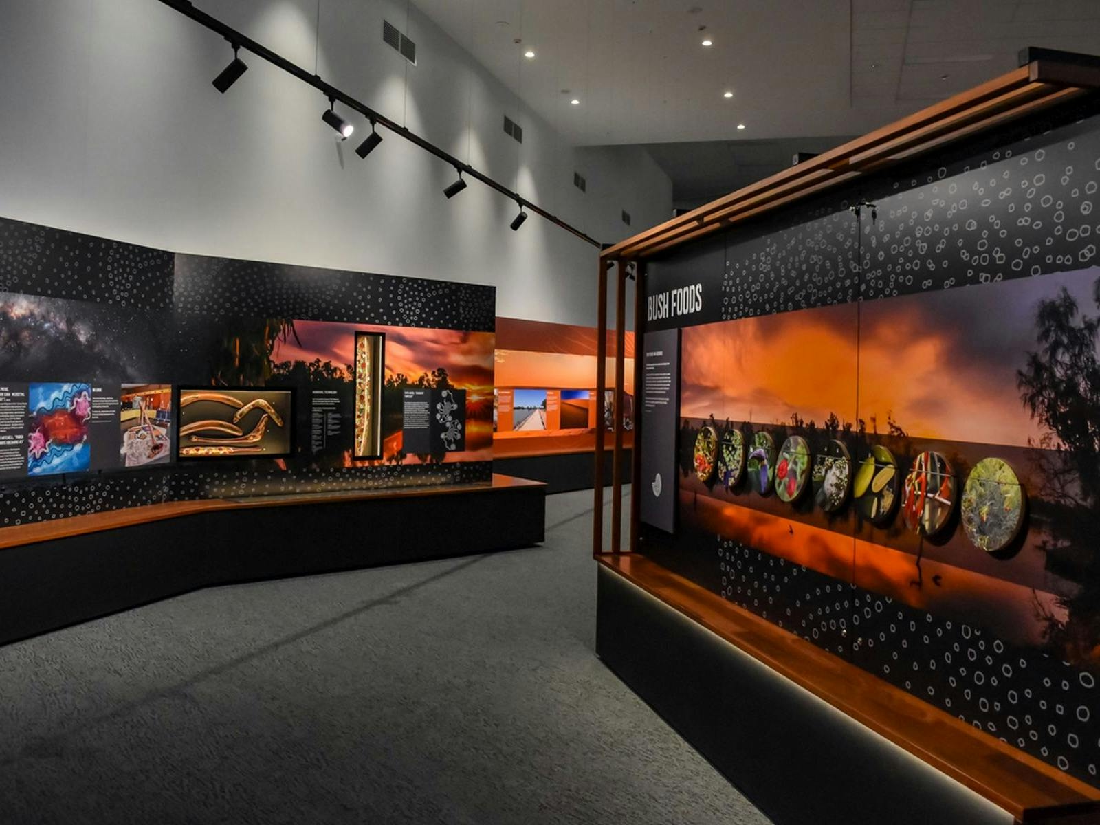Practical Information for Visitors features a brightly lit interior with overhead track lighting.