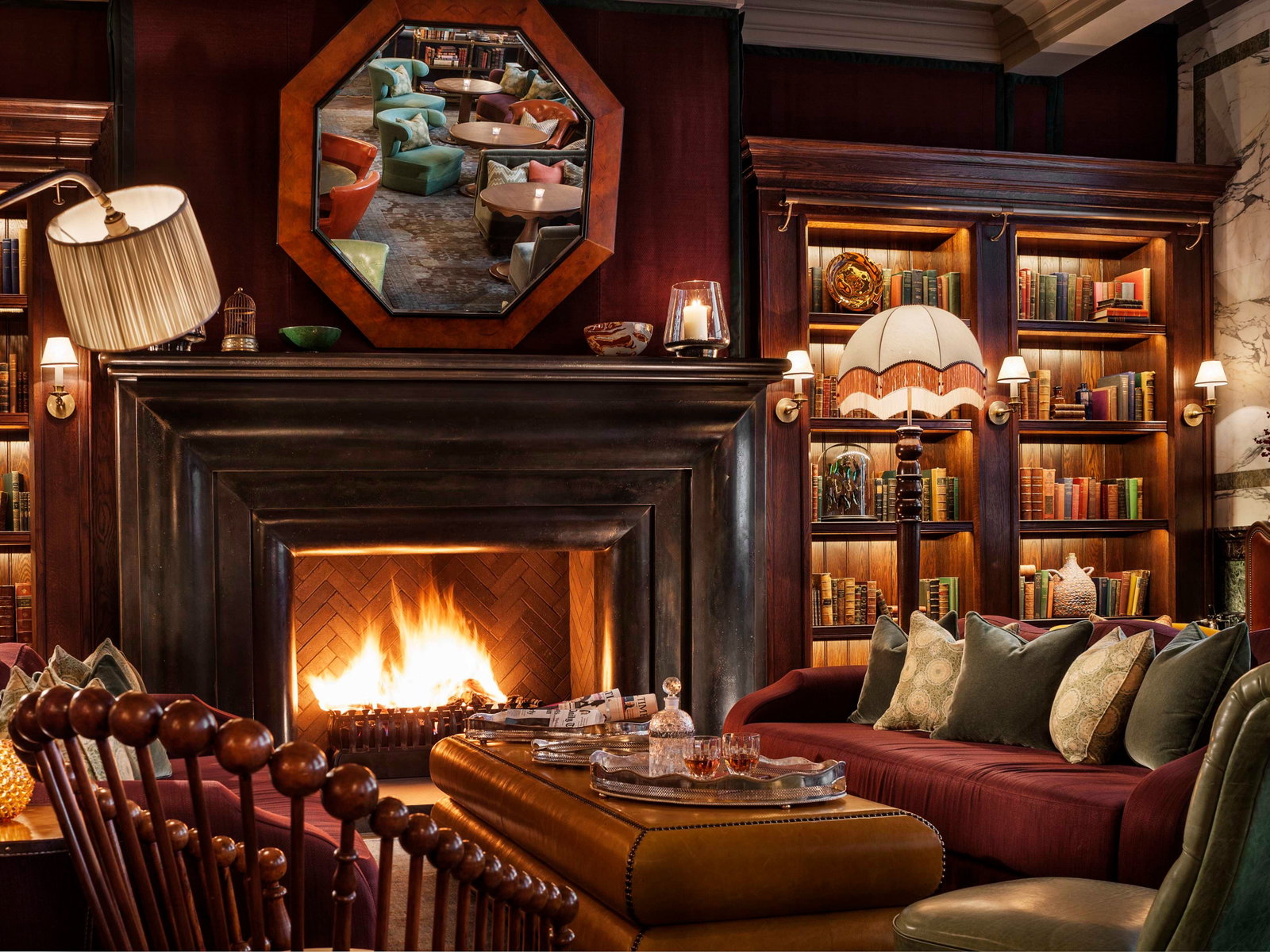 Video: London's Scarfes Bar features a grand fireplace, creating a warm and inviting atmosphere.