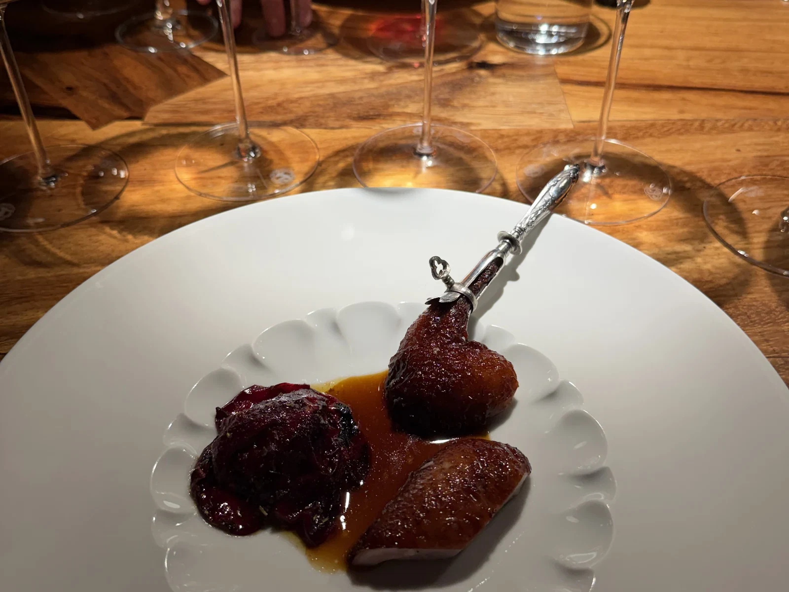 Wolfe Ranch quail with fruit sauce during the July 2026 Enclos dinner