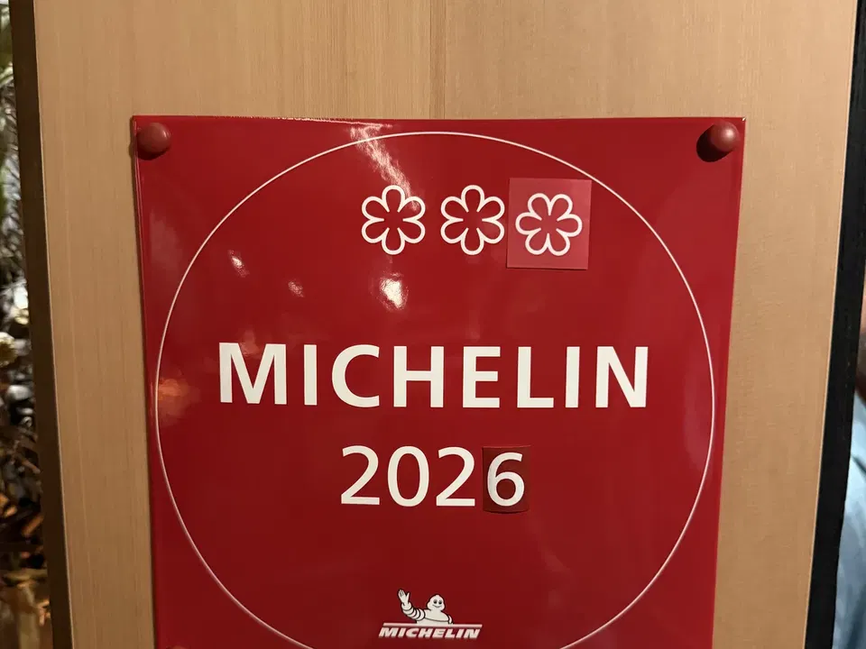 Red Michelin 2026 plaque with three stars inside Enclos in Sonoma
