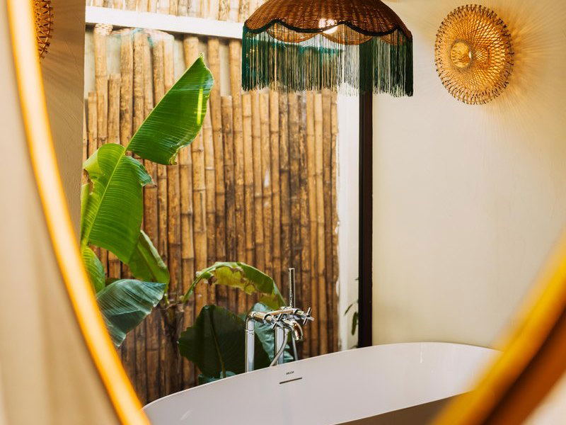 The Sanctuary Spa at ENVI Paje Zanzibar offers a tranquil escape with tropical design and a luxurious freestanding tub.