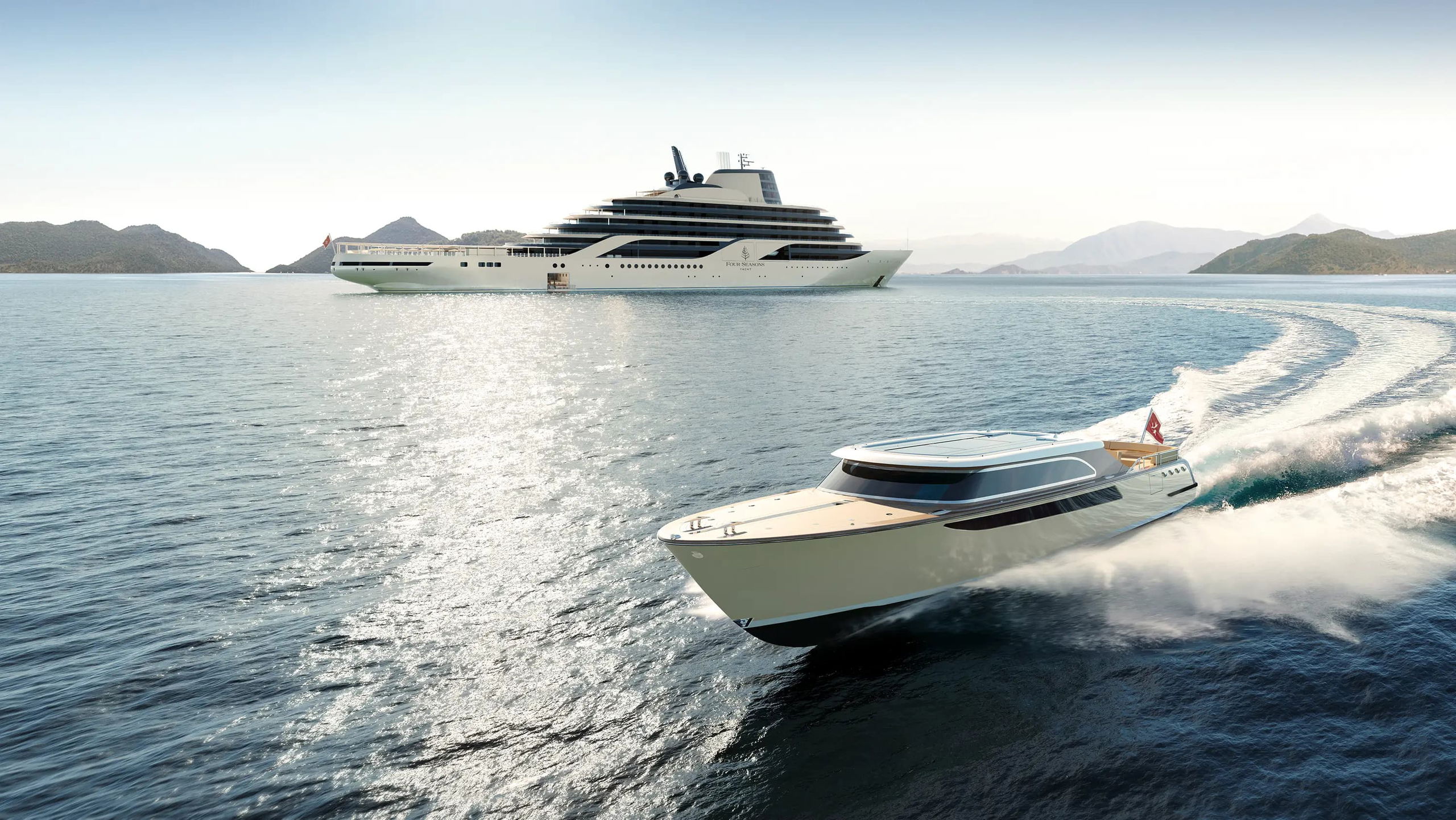 Luxury cruise ship anchored in tropical waters with smaller speedboat in foreground and forested islands in background