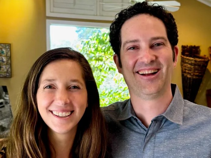 Hailey Trefethen and Lorenzo Trefethen smile together, celebrating a family governance moment.