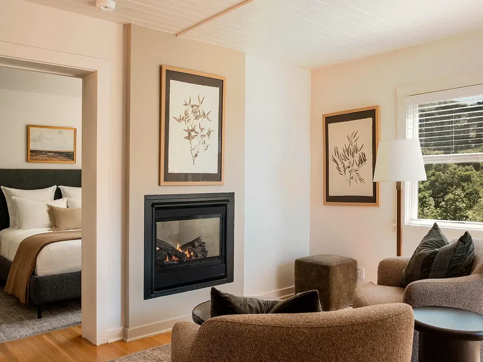 Ocean-facing Shorepine cottage interior with a gas fireplace at Harbor House Inn