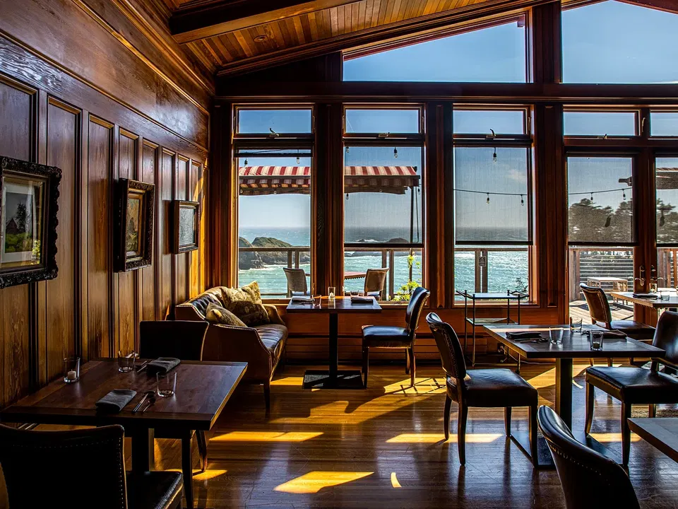 Harbor House restaurant dining room with redwood walls and Pacific Ocean views