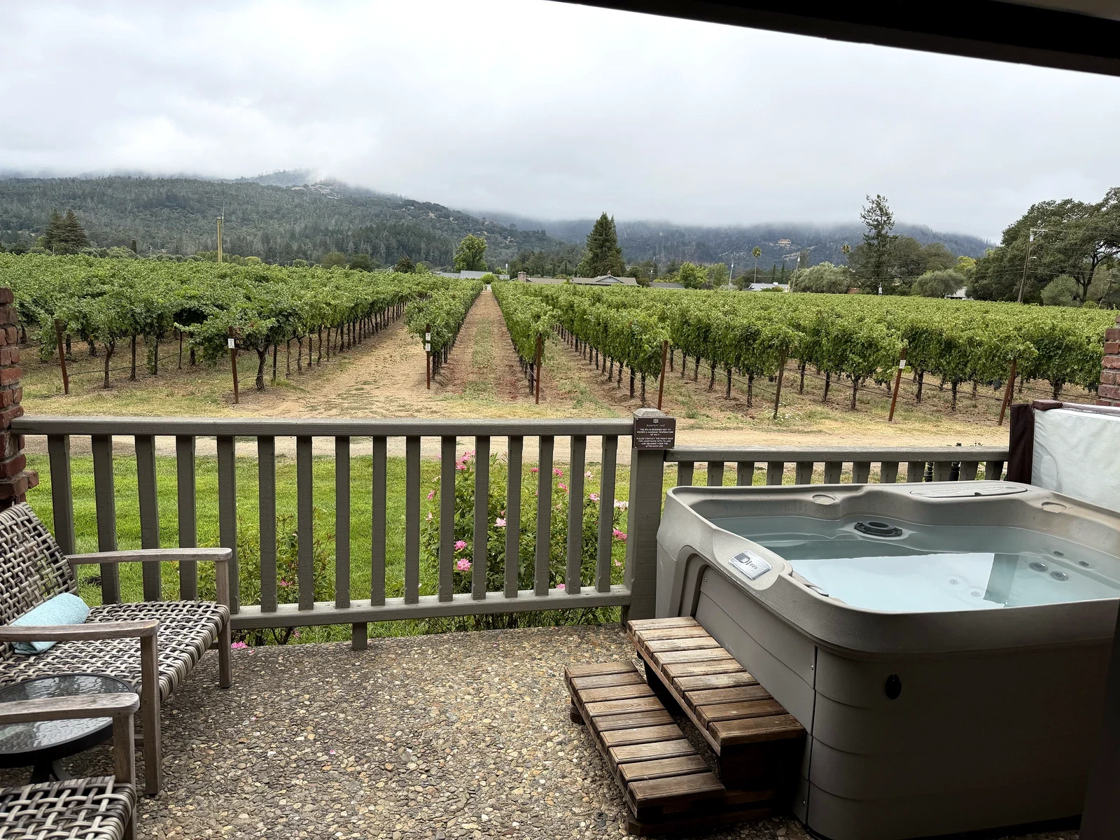 Private hot tub overlooking Leonardini Vineyard and fog on the Mayacamas Mountains
