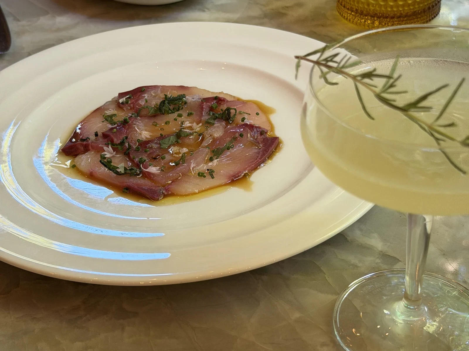 Harvest Table hamachi crudo with yuzu tamari olio nuovo and shiso
