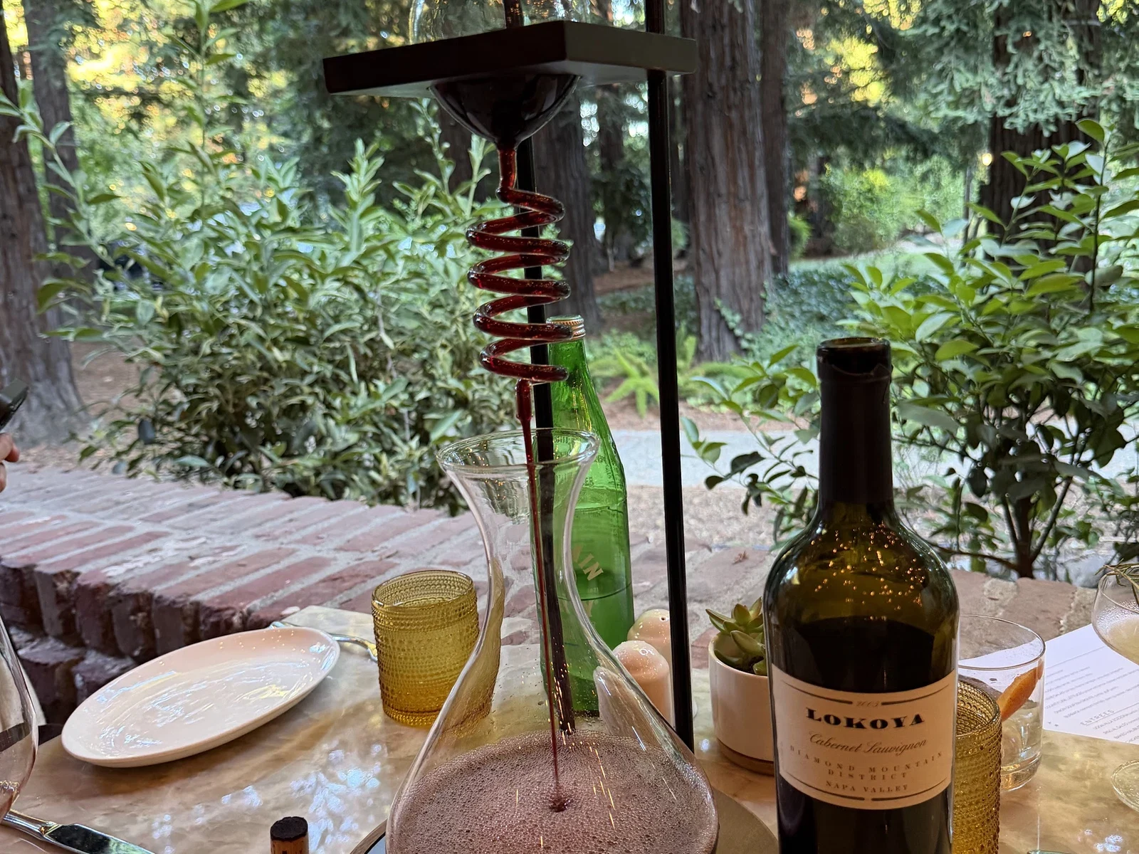 Spiral wine decanter Parker House rolls and Cabernet at Harvest Table