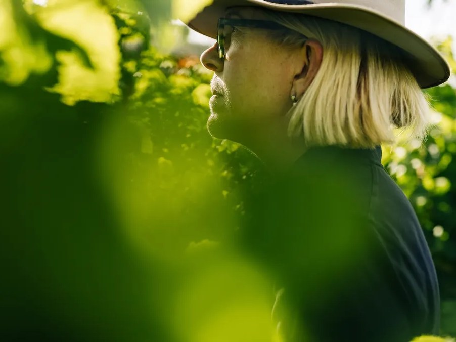 Hombeline Guyon in her vineyard, embodying a philosophy of winemaking.