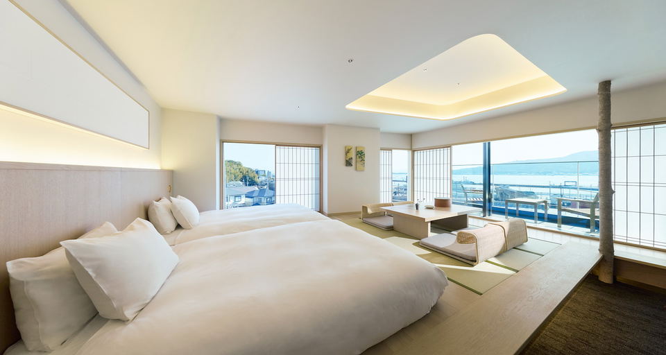 Hotel Fork & Knife Miyajima offers serene rooms with a blend of traditional and modern design, and stunning views.