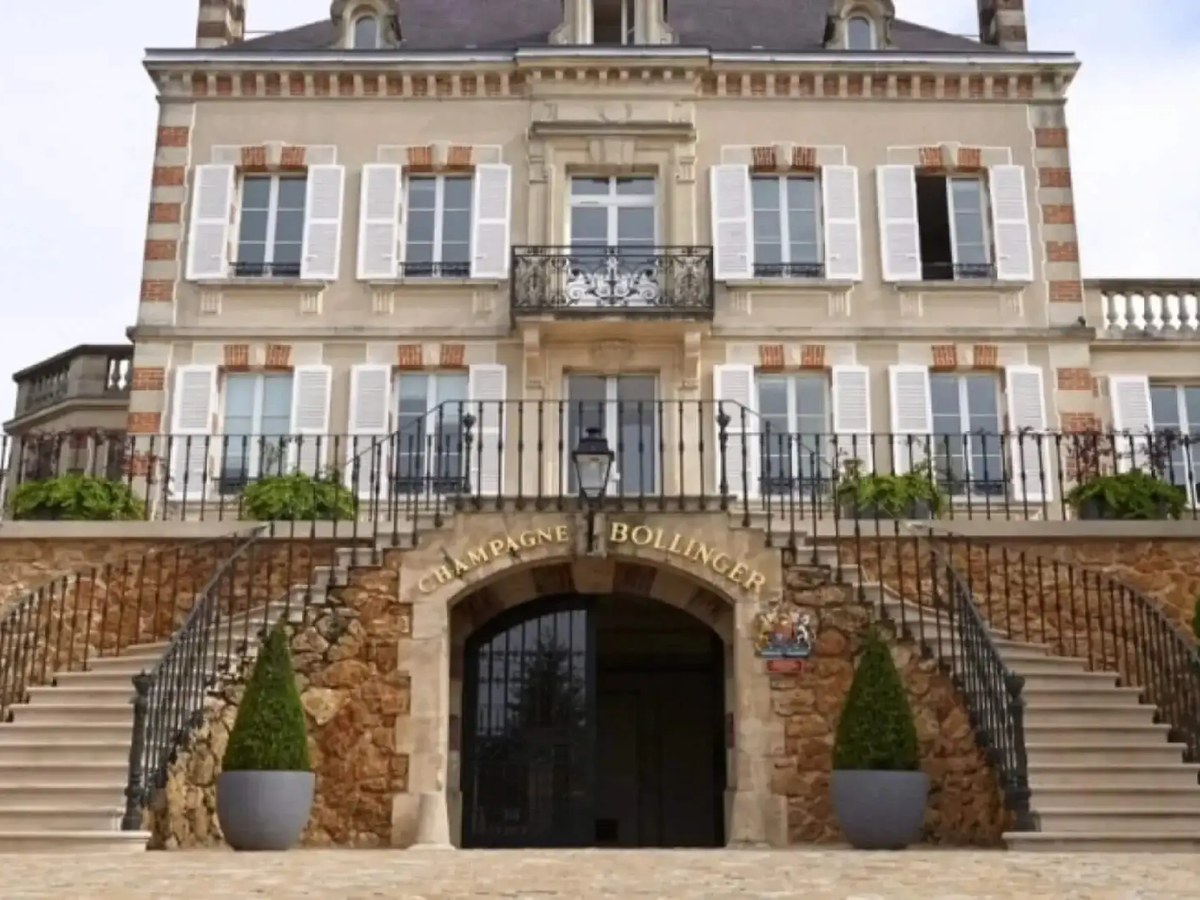 Champagne Bollinger building with stairs and decorative plants.