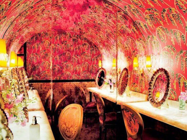 A nightclub at 5 Hertford Street offers an intimate, dimly lit atmosphere in its ornate powder room.