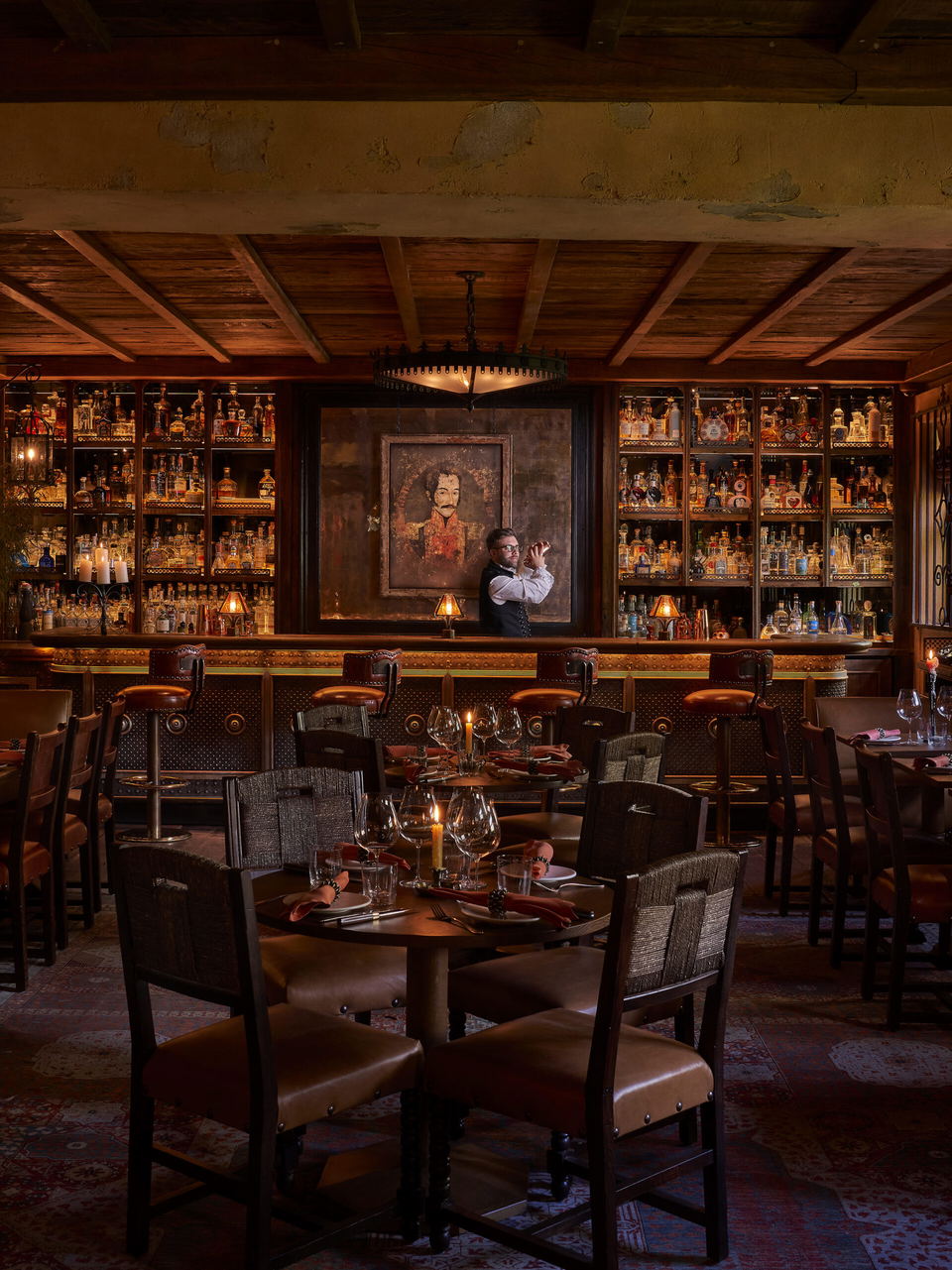 The Verdict on Annabel's, with its warm, glowing ambiance, features a richly stocked bar.