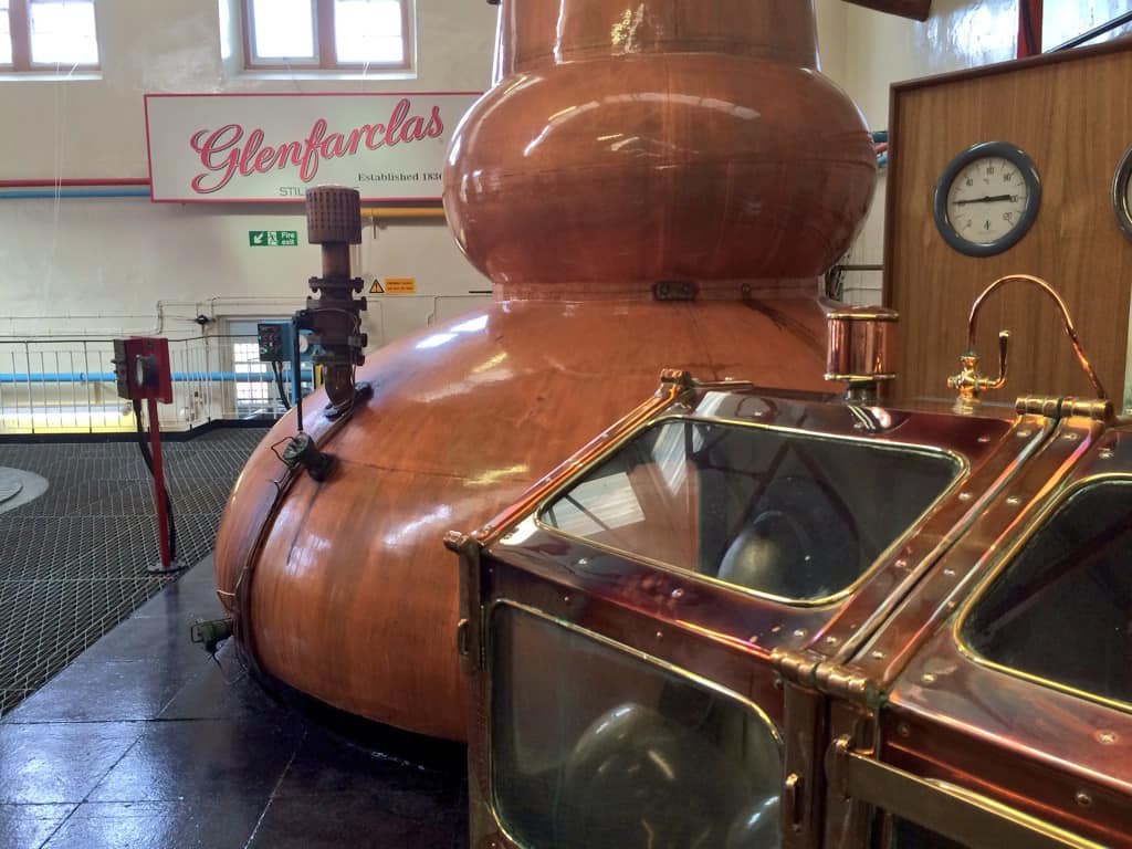 Glenfarclas Distillery's gleaming copper stills, the working heart of the distillery.