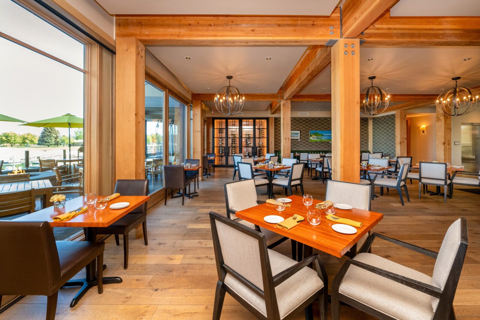 Dining and Drinks, showcasing prominent wooden beams that define the spacious interior.
