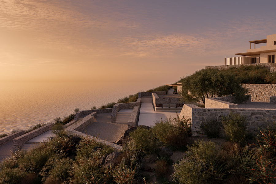 Luura Paros' terraced stone architecture overlooks the sea at sunset, embodying Cycladic design.