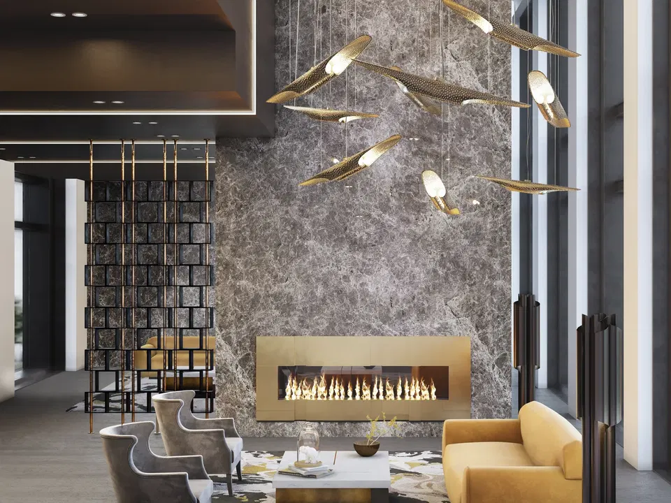 Waldorf Astoria Miami Beach offers a sophisticated lounge with a modern fireplace and striking lighting fixtures.