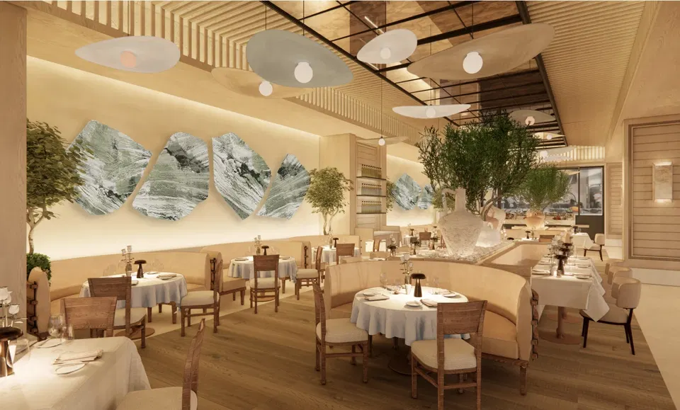 Avra Estiatorio (Back Bay) features striking green and white marble-like wall art.