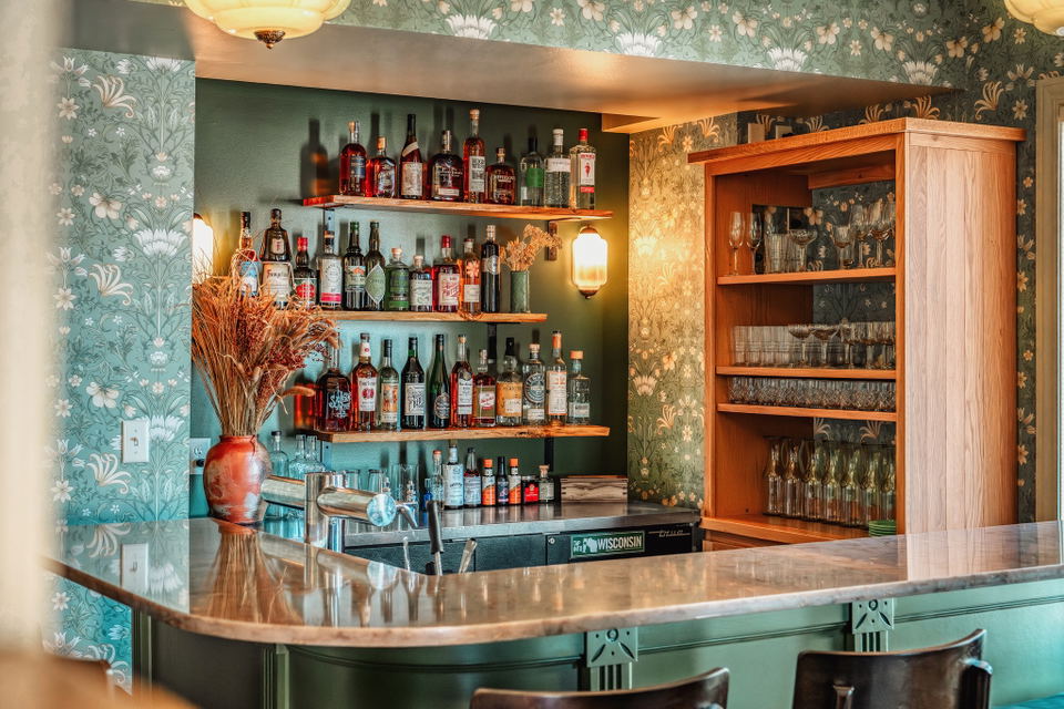 Mother's East Tavern (South Boston) features a distinctive floral wallpaper pattern.