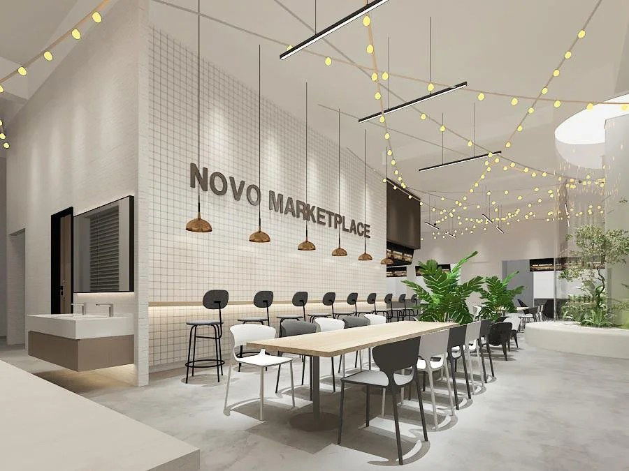 Novo Marketplace offers a modern dining experience with communal tables, bar seating, and festive lighting.