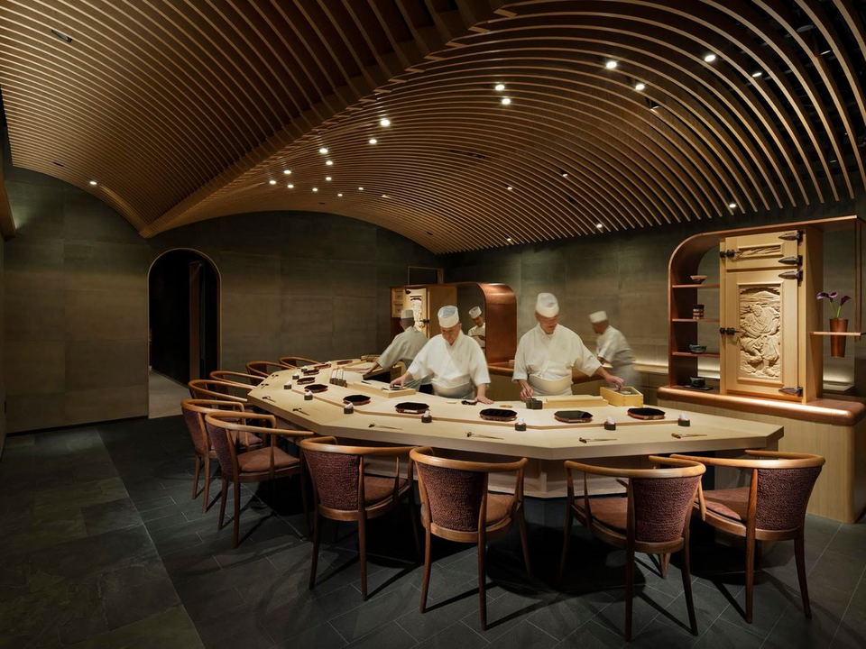 An intimate hinoki counter offers a chef's counter experience for private dining nyc.
