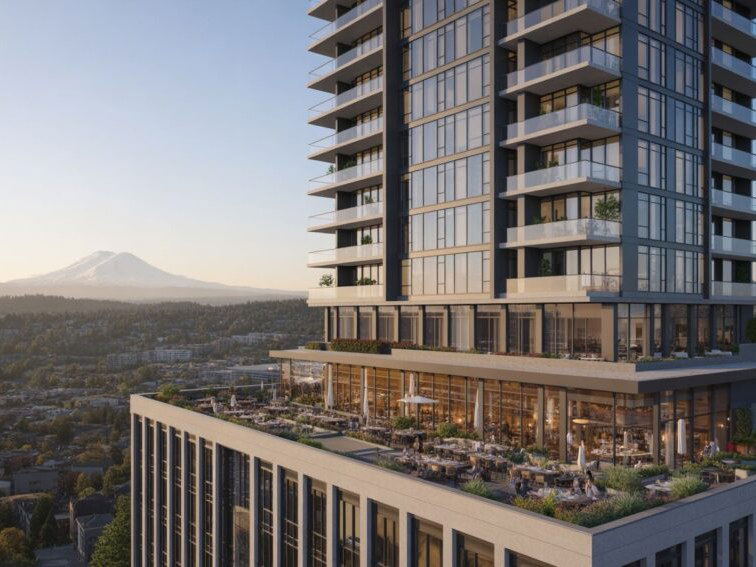 A high-rise building with a rooftop restaurant and outdoor dining area, with a snow-capped Mount Rainier in the background.