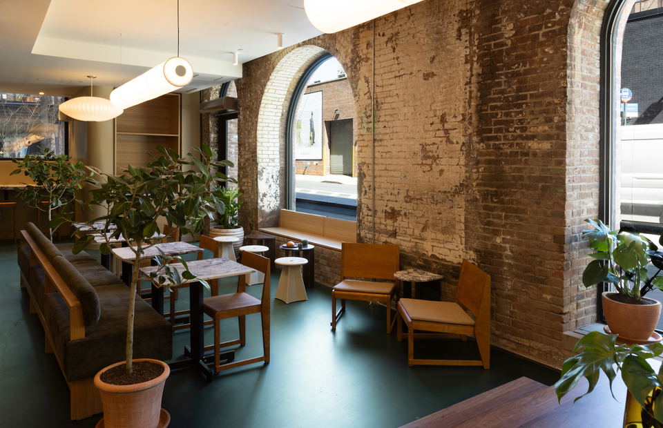 Botequim at Birdee (Williamsburg) features a large arched window overlooking the street.