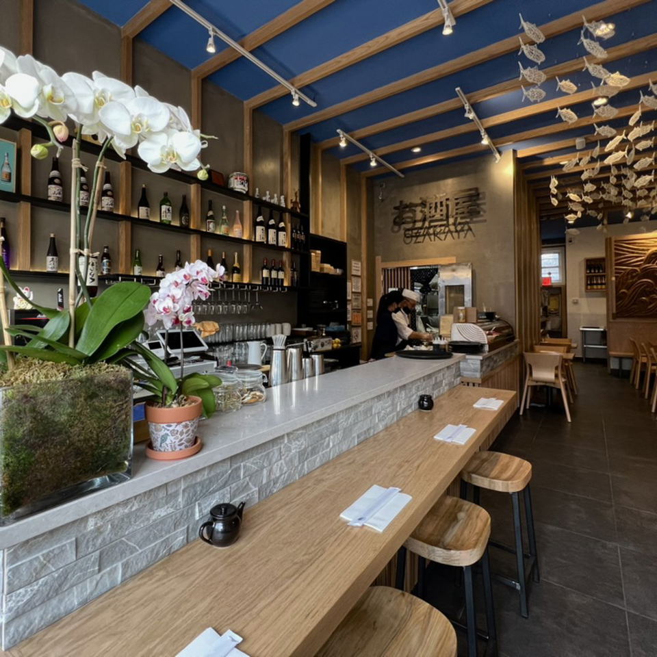 Ichie (Crown Heights) features a striking blue ceiling with wooden beams.