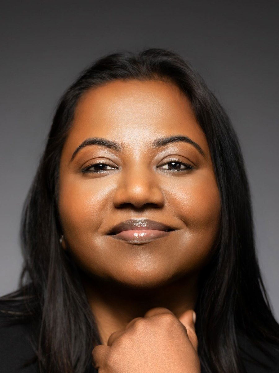 Chef Aarthi Sampath, owner of Dravida (East Village), smiles confidently.