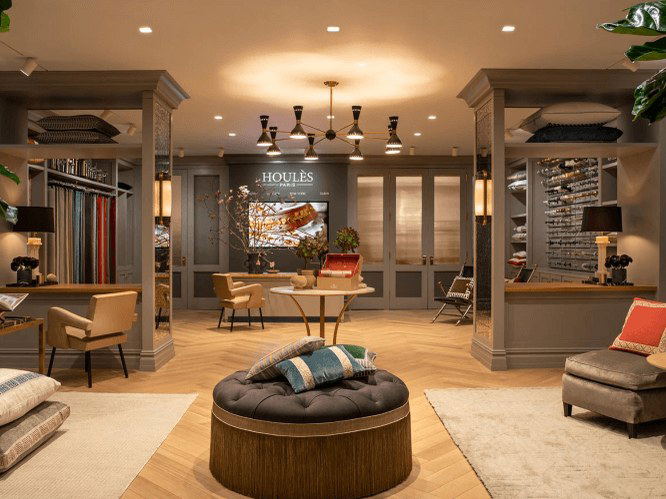 HOULÈS PARIS showroom at New York Design Weekend, showcasing luxury textiles and decor.