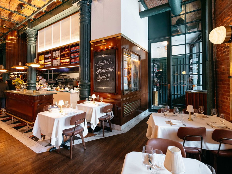 An elegant dining room, a mid-tier Dorsia partner, offers exclusive access to upscale restaurant experiences.