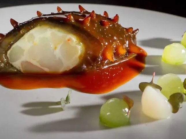 A plated tasting-menu course at a fine-dining restaurant.