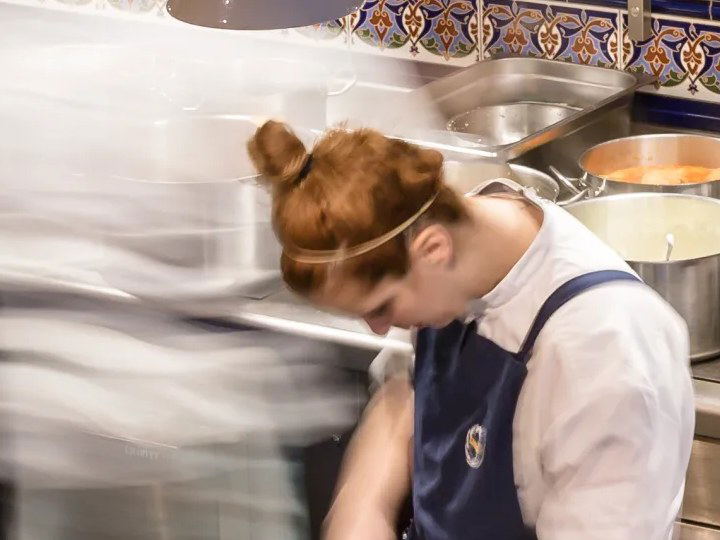 Chef working in a busy kitchen