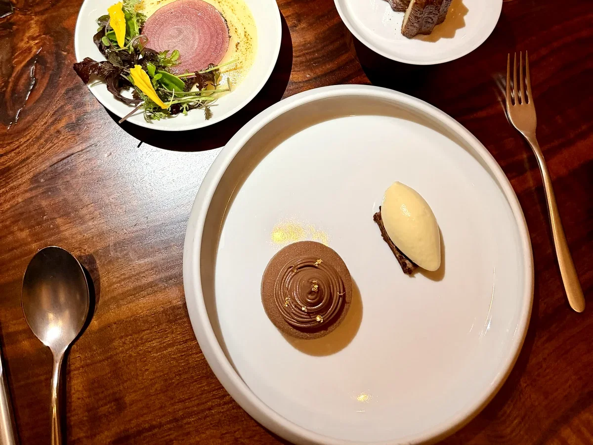 Multiple fruit, chocolate, and cultured dairy desserts shared at PRESS Restaurant