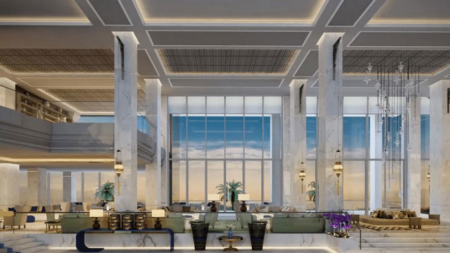 A grand hotel lobby with high ceilings, large windows, and luxurious seating areas, featuring marble columns and ornate lighting.