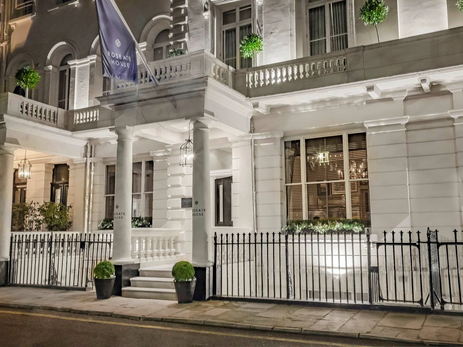 Roseate House London illuminated at night on Westbourne Terrace