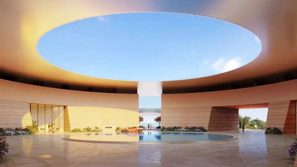 A contemporary architectural interior with a large circular oculus opening to sky, featuring a central white column, curved pool, and modern Arabian d