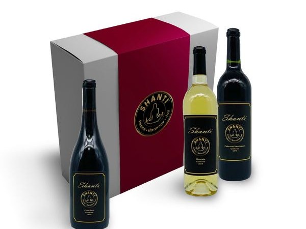 Shanti Winery's diverse wine selection, featuring three bottles and a branded presentation box.