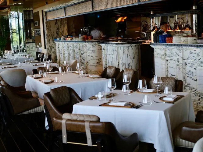 The Cullinan: Sheikh Hamdan-approved fine dining in Dubai, featuring a luxurious open kitchen and elegant setting.