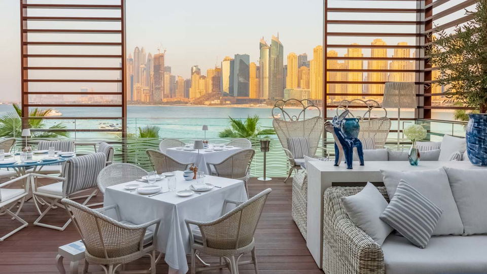 Alici (Bluewaters Island), adorned with striking blue and white coastal-inspired decor.