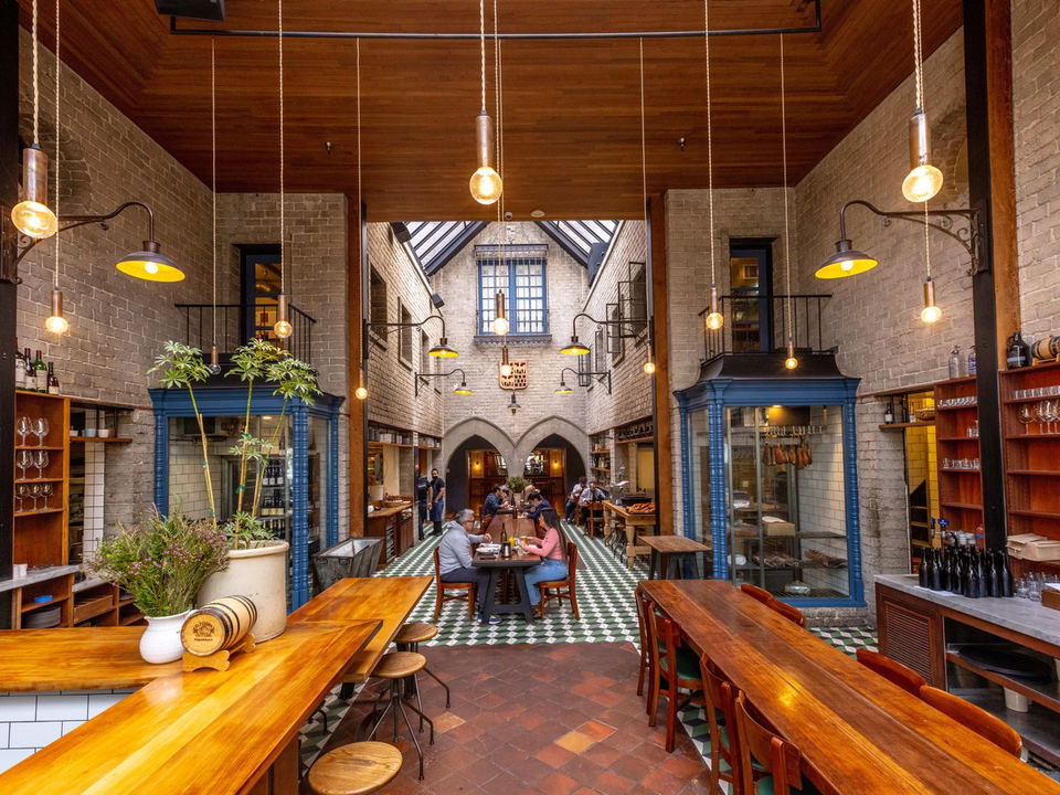République's distinctive dining room, a converted 1920s Charlie Chaplin building, offers a grand French dining experience.
