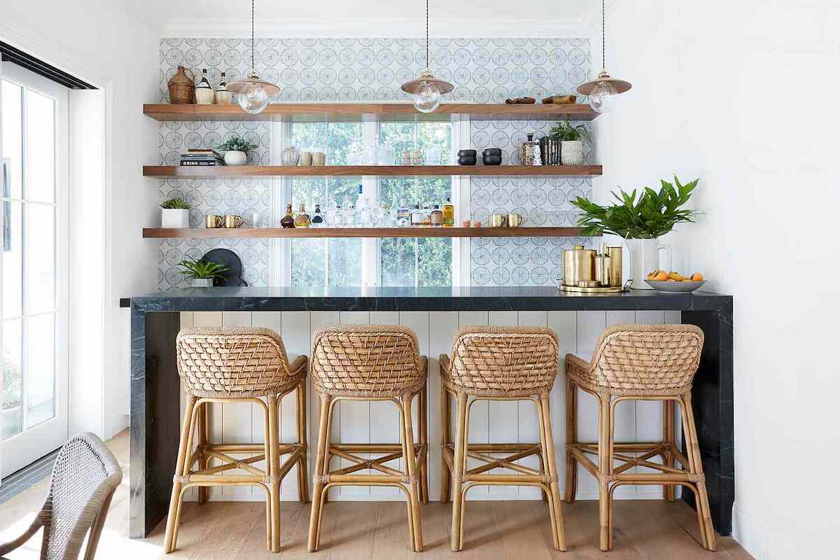 Drinks features inviting rattan bar stools, perfect for a relaxed evening.