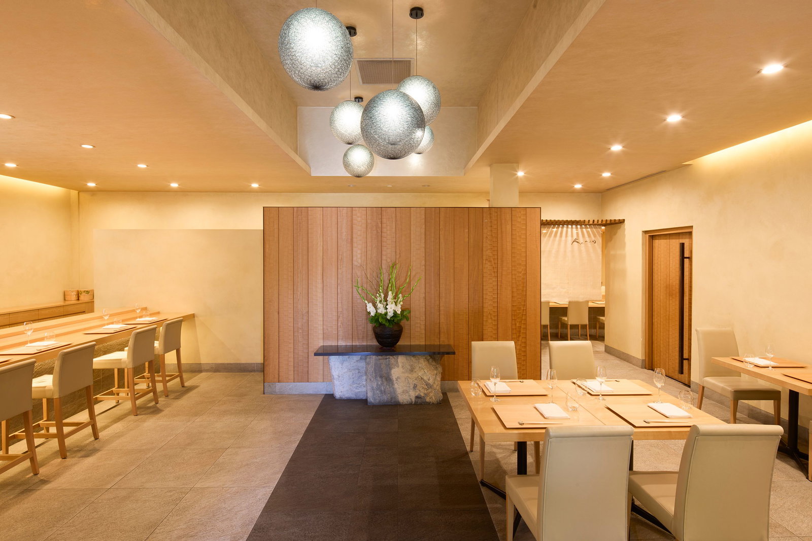 7. Kenzo, Napa features striking spherical pendant lights that illuminate the serene interior.
