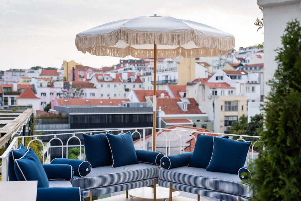 Villa Dorothéa Lisbon offers a rooftop oasis with views of the Lapa neighborhood's terracotta rooftops.