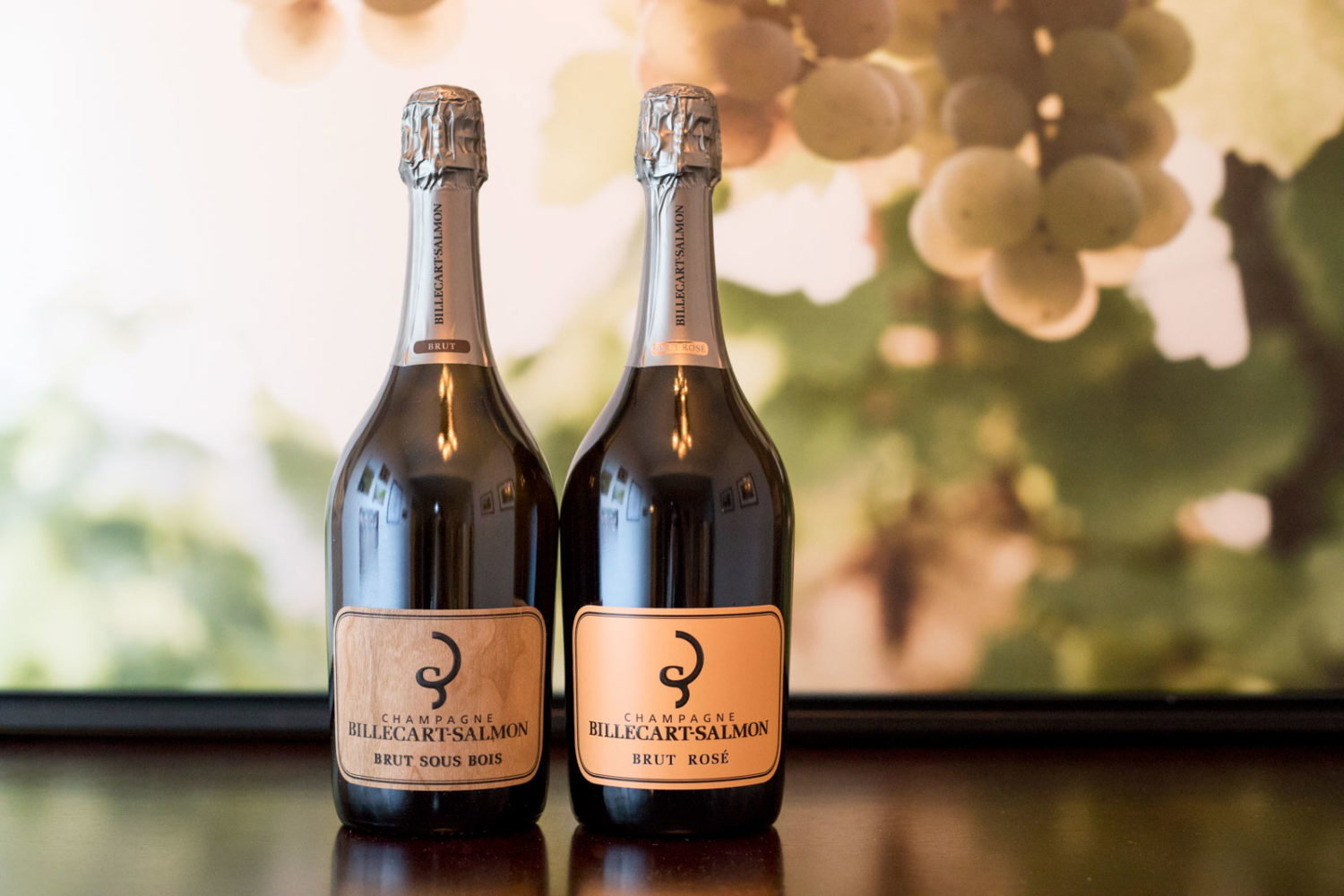 Champagne Billecart-Salmon × Domaine Fourrier (SOLD OUT), featuring contrasting label hues on dark bottles.