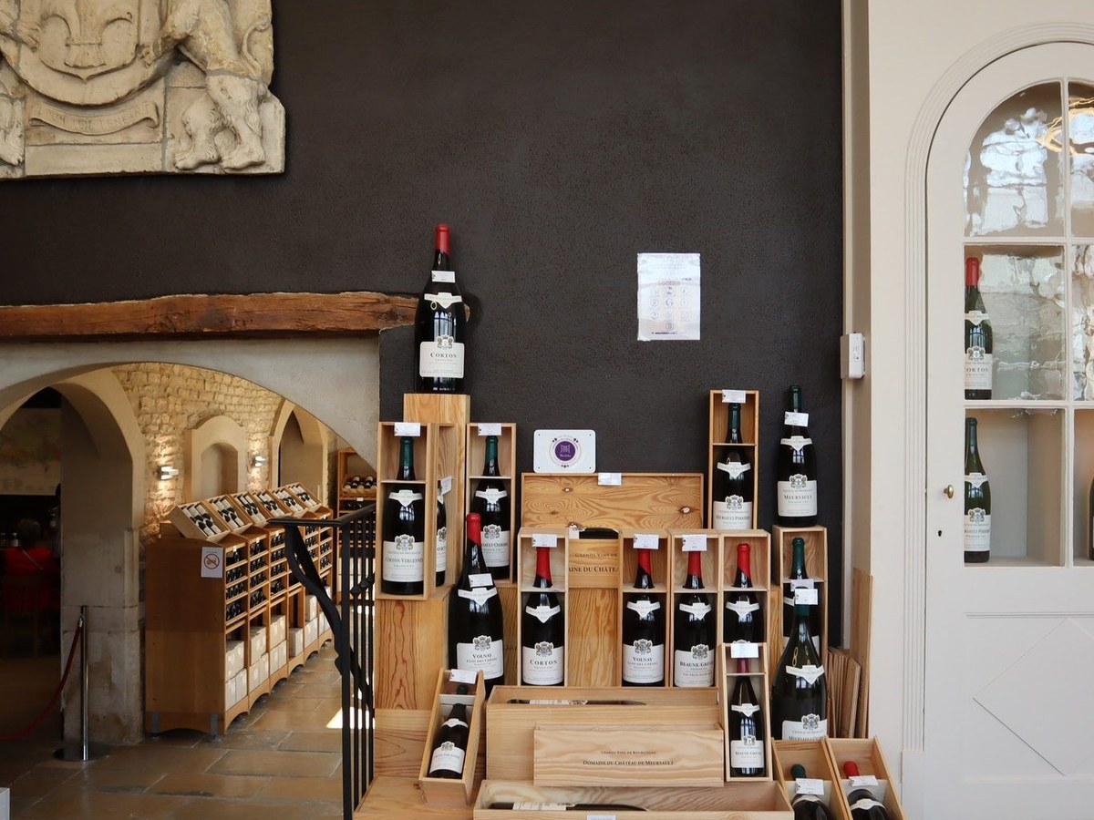 Wine bottles displayed in a cellar or shop