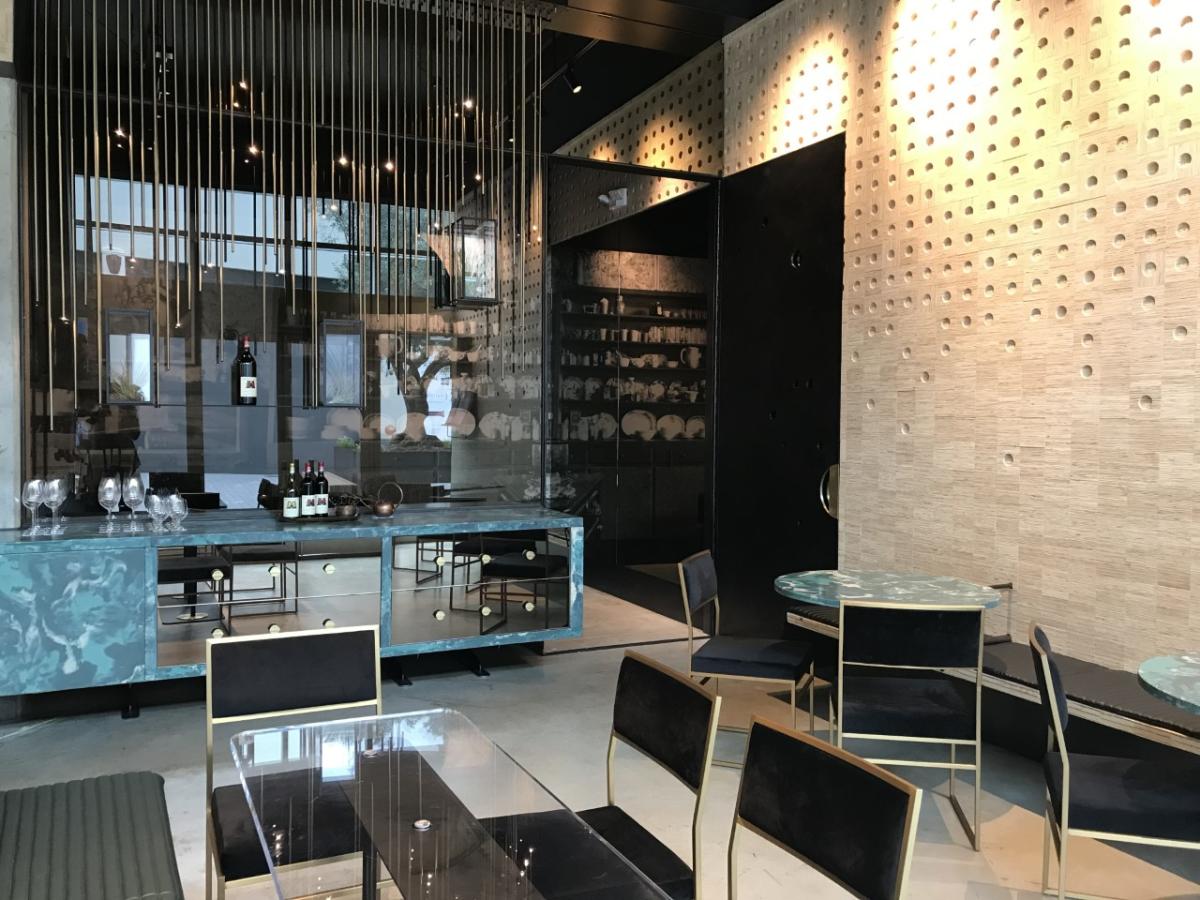 The Mayacamas Experience: Tasting and Hospitality features a striking blue-green counter.