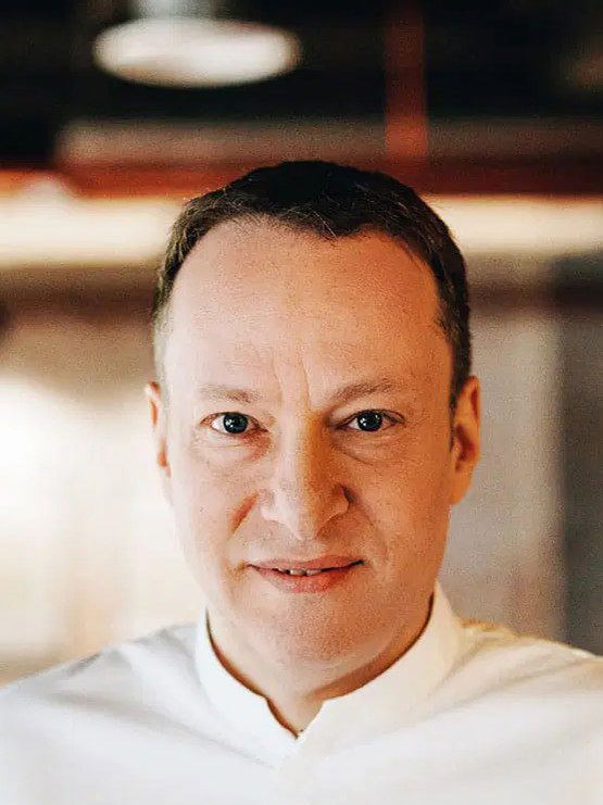 Etienne Dalançon, general manager of Waldorf Astoria Kuala Lumpur, in a white shirt.