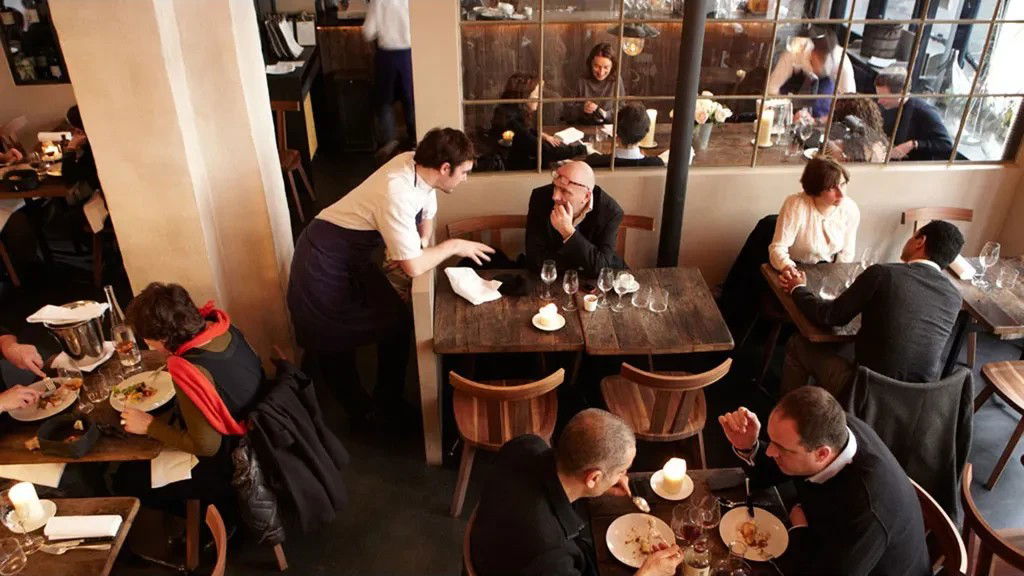 Septime: A warm, intimate modern bistro setting, embodying the serious-but-unpretentious Paris dining neighborhoods.